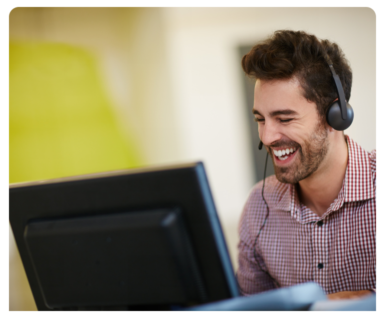 Happy customer service representative at desk